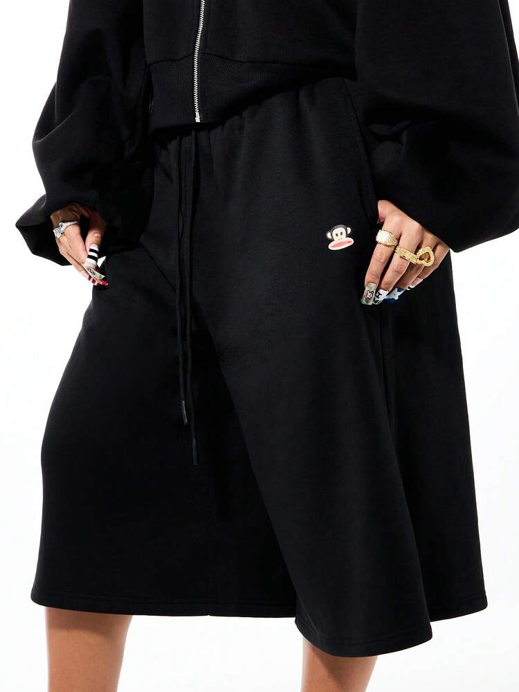 SUMWON Shorts Pantacourt Feminina de Tecido Jersey com Estampa Gráfica, Modelagem Larga e Solta, Cintura com Cordão e Design de Logo Coração de Macaco