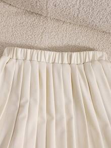 SHEIN 无袖蝴蝶结开衫上衣搭配百褶裙，优雅两件套，适合少女夏季穿着。 - 杏色 - 查看 3