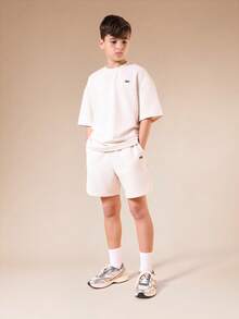 SUMWON Ensemble coordonné de t-shirt à manches courtes côtelé et short pour garçons préadolescents. Tenue d'été décontractée, col rond, coupe régulière - Nude - Voir 1