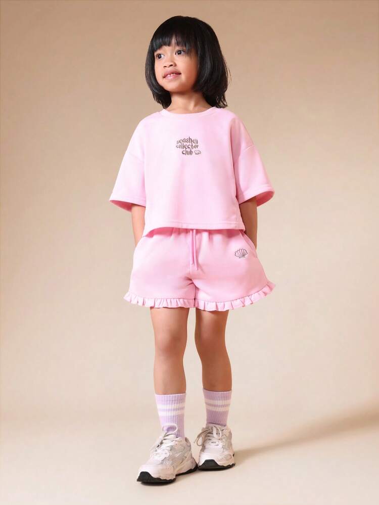 Dziewczęcy T-shirt kolekcjonerski z różowymi muszelkami i szortami z falbanką na dole, letni, swobodny, dwuczęściowy zestaw