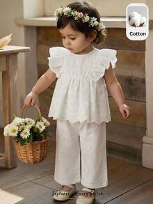 Cozy Pixies Set de 2 piezas de top sin mangas con estampado floral ditsy y pantalones casuales sueltos para niña bebé. Conjunto de 2 piezas de ropa para niñas con estampado floral. Conjunto de falda y top con lazo para niña bebé en estilo vintage. Conjunto de falda con estampado floral y top con lazo para niña bebé. Conjunto de 2 piezas de top con lazo y falda floral para niña. Conjunto coordinado de niña. Conjunto de falda y ropa para niña bebé. - Multicolor - Ver 8