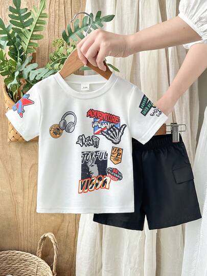 SHEIN Vintaside Kids Bộ quần áo hè 2 món cho bé trai, kiểu dáng thời trang gồm áo tay ngắn in chữ hoạt hình và quần short màu trơn, năng động và dễ thương, phù hợp cho các hoạt động ngoài trời, mặc nhà thoải mái và các buổi tụ họp thường ngày.