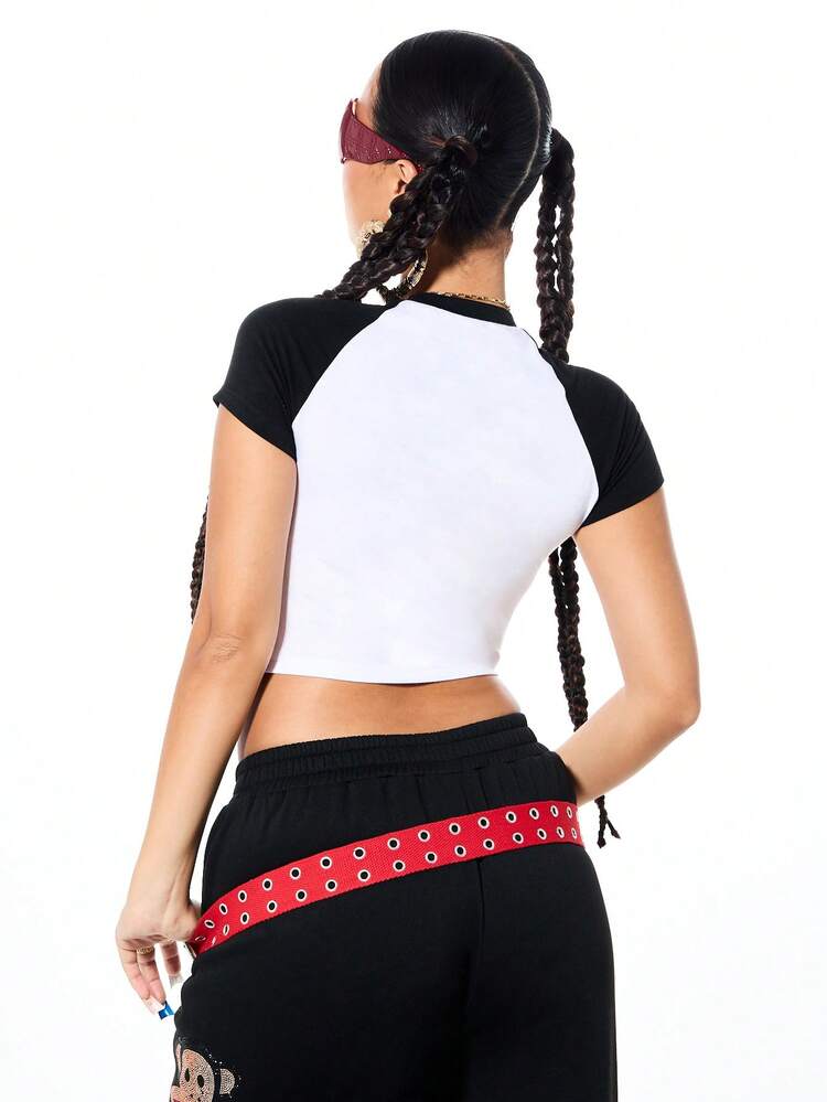 SUMWON Women's Rhinestone Embellished Raglan Sleeve Baby Tee With Sparkle Character Design And Contrast Black Sleeves Casual Crop Top