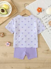 SHEIN Bộ 2 món cho bé gái, áo thun cổ tròn tay ngắn in hình trái tim và hoạt hình, kèm quần short, dễ thương và thời trang. - Màu tím - Xem 2