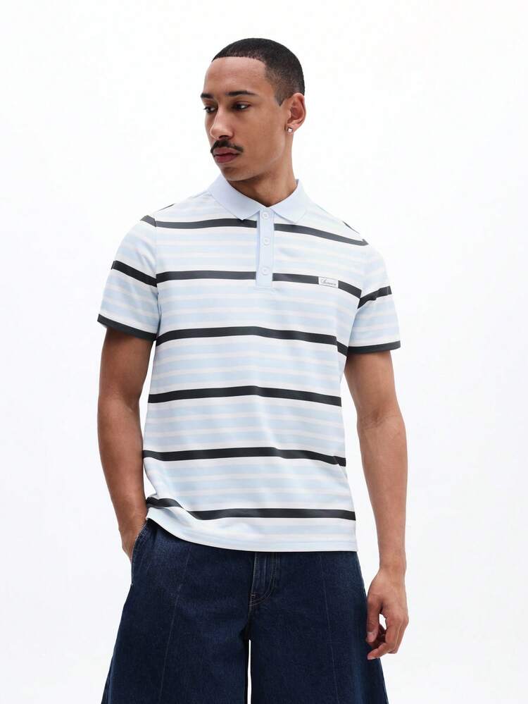 Camisa polo a rayas con tapeta de botones