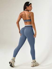 Dewbera Bộ đồ thể thao nữ kẻ sọc, xếp ly, áo croptop cổ yếm và quần legging. - Màu xanh bụi bặm - Xem 6