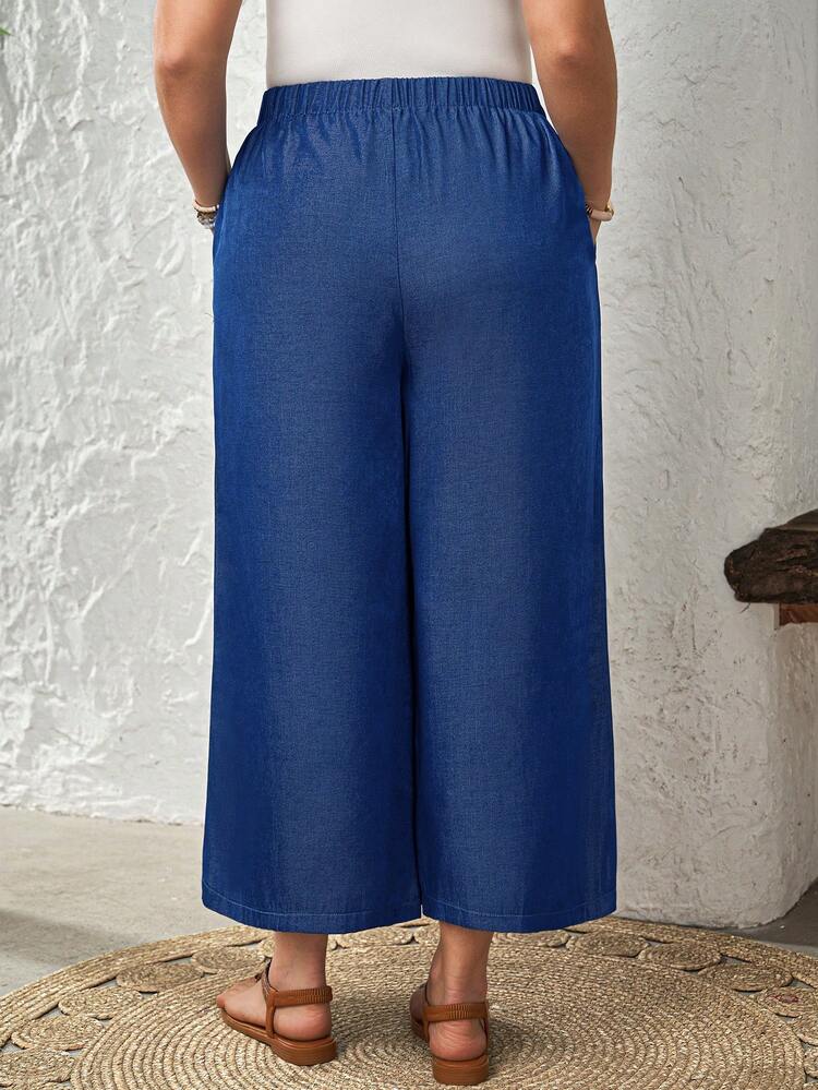 Plus Size Women's Summer Casual Vacation Country Solid Color Faux Denim Blue Cropped Pants With Pockets, Spring/Summer,Summer\Vacation,Summer Holiday,Spring Break Outfits ,Vacation Outfits Women ,Holiday Outfits For Women,Going Out Outfits,2026 New Clothes,Simple And Fashionable For Everyday Wear,Suitable For Summer, Vacation, Daily Wear