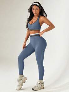 Dewbera Bộ đồ thể thao nữ kẻ sọc, xếp ly, áo croptop cổ yếm và quần legging. - Màu xanh bụi bặm - Xem 4