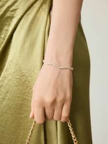 MOTF PREMIUM Vòng tay mạ vàng 18k đính đá quý trắng, kiểu dáng lượn sóng, thể hiện cá tính. - Vàng - Xem 1