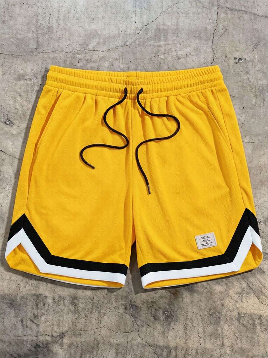 AXEPEAK Quần short nam dáng rộng, có chi tiết chữ thêu và viền tương phản, cạp chun có dây rút. - Màu vàng - Xem 1