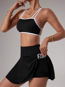 Gameset SHEIN Sport Conjunto esportivo feminino composto por top cropped sem costas com amarração nas costas e minissaia. - Preto e Branco - Ver 6