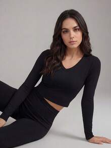 Anewsta Damtopp med V-ringning, ribbad långärmad design, nyhet för hösten - Svart - Visa 5