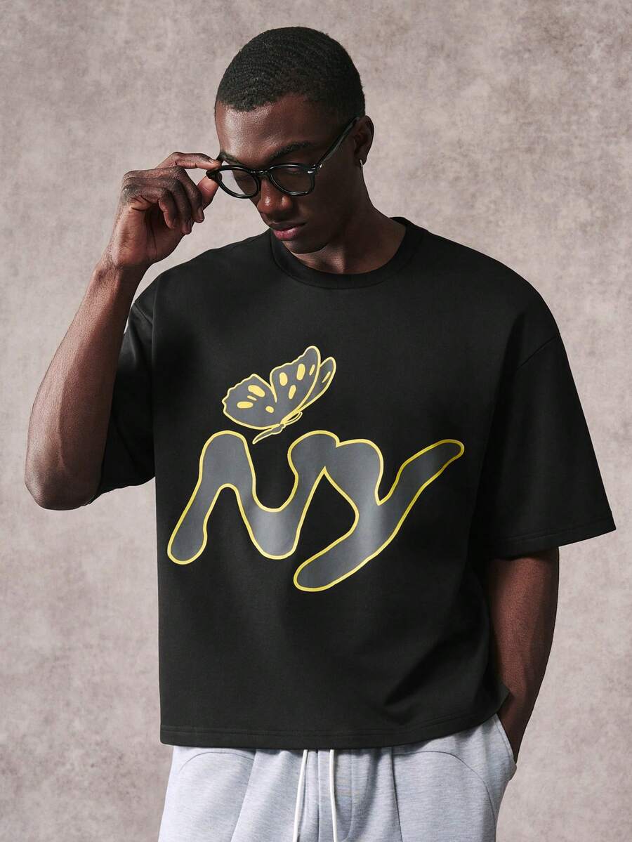 STYNVO Men's Letter Graphic Round Neck Short Sleeves Casual T-Shirt - Black - View 1