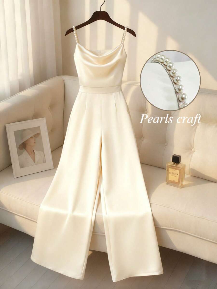 GlowEve Women's Sleeveless Spaghetti Strap Waist Cinched Draped Neck Jumpsuit, Shiny Fabric, Suitable For Commuting And Dating, Long Length - Champagne - View 1