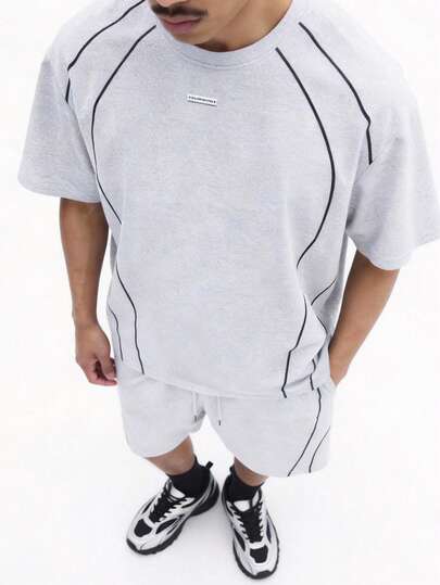 SUMWON Conjunto de camiseta de manga corta y pantalones cortos en color gris claro con ribete de contraste negro para uso casual de verano