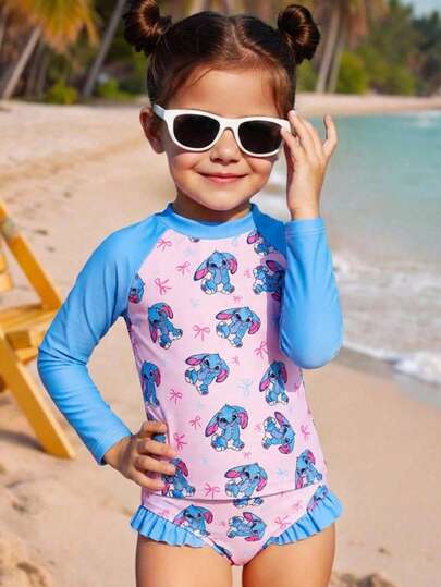 SHEIN Conjunto de traje de baño de manga larga con estampado de dibujos animados para niñas jóvenes