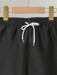 SHEIN Tween Boy Solid Color Drawstring Waist Swim Trunks - Black - View 5