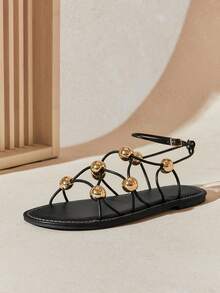 SHUZIA Women's Gold Dome Accent Roman-Strap Black Sandals – Sleek, Modern & Statement-Making. - Black - View 2