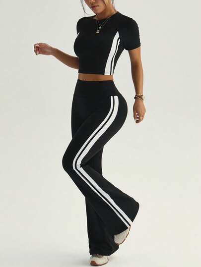 SHEIN With My Calm 女士黑色紧身两件套运动服，圆领短袖上衣和喇叭裤侧边饰有撞色条纹，适合日常休闲穿着、跑步、瑜伽、健身、网球、高尔夫等运动。
