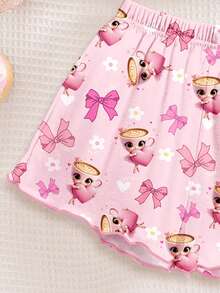 SHEIN Cốc sứ màu hồng kem, hình công chúa ba lê hoạt hình trái tim dễ thương, in hình nơ và hoa, bộ đồ ngủ tối giản thoải mái cho bé gái gồm áo hai dây và quần short hoạt hình, thích hợp mặc ở nhà vào mùa hè, bộ áo hai dây, bộ áo hai dây và quần short, thoải mái dễ chịu, phong cách thư giãn, giản dị, nữ tính. - Nhiều màu - Xem 4