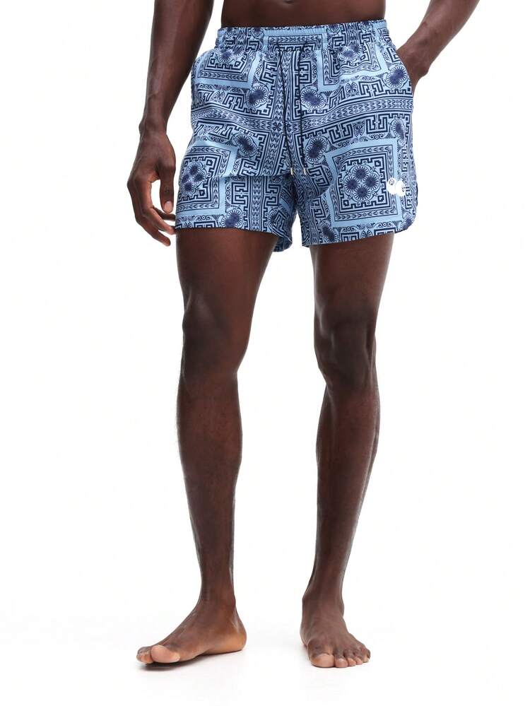 Maillots de bain pour hommes avec imprimé cachemire, cordon de serrage à la taille. Maillots de bain décontractés pour les vacances d'été, la plage et la promenade. Motif géométrique bleu