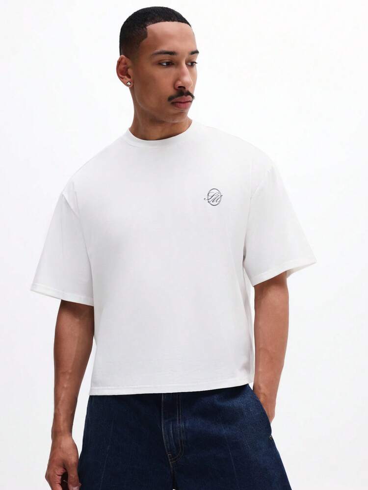 Camiseta de algodón de manga corta con cuello redondo y ajuste boxy, con estampado gráfico del Club de Saint Tropez, moda de verano y ropa urbana para hombre