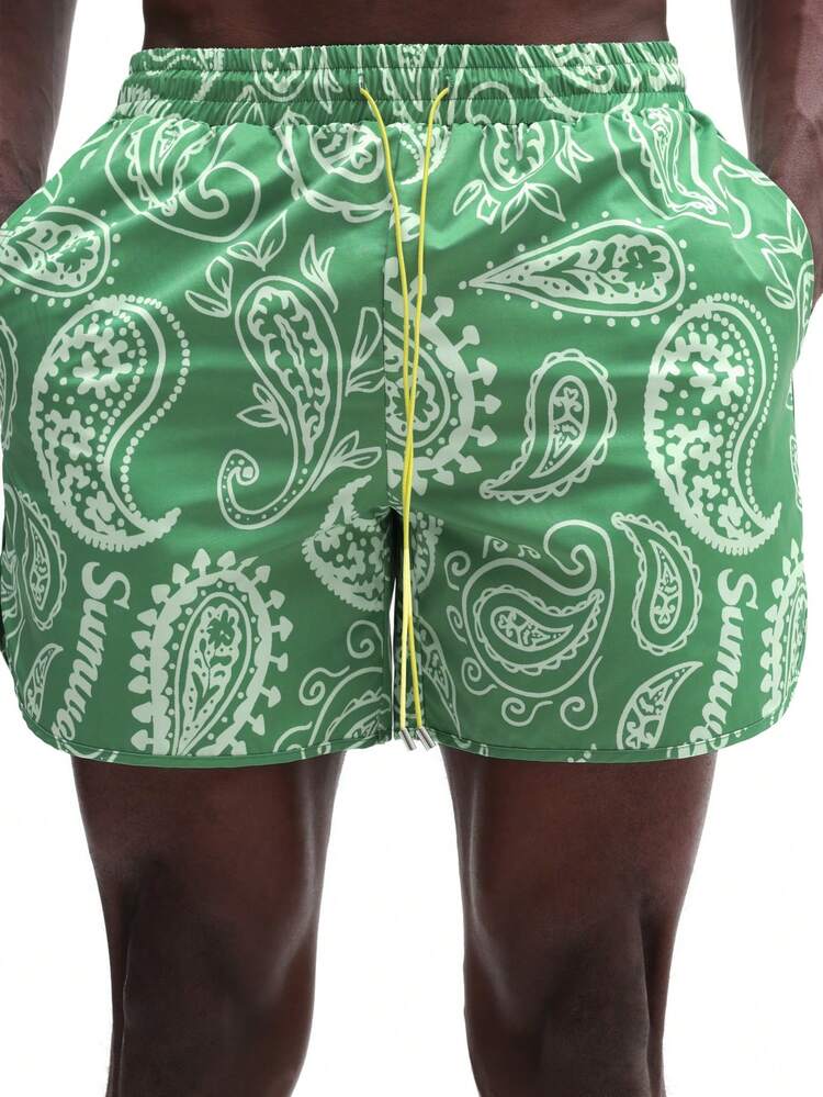 Herren grüne Paisley-Muster Badeshorts mit elastischem Kordelzug, Seitentaschen, Sommerbadehose mit geschwungener Kante, Boardshorts für tropischen Urlaub