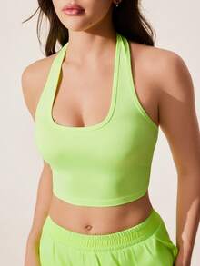 Core Rhythm Top deportivo corto sin espalda de unicolor con cuello halter - verde fluorescente - Ver 7
