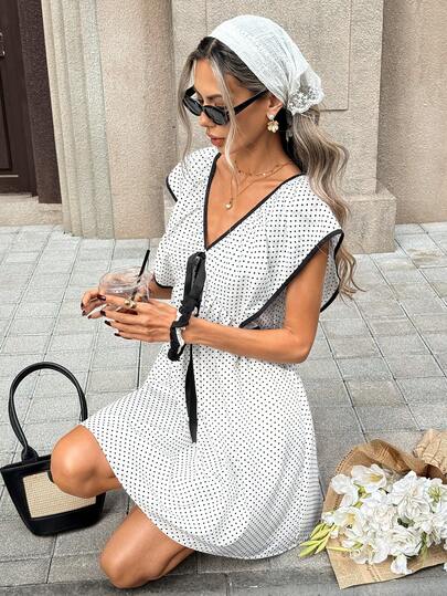 SHEIN PariChic Women's Polka Dot Casual And Elegant Dress. This Casual Polka Dot Ruffled Mini Dress Is The Perfect Choice For Creating A Summer Vacation Look. The Bows At The Front And Back Complement Each Other, While The Tie Design At The Back Allows For Greater Freedom Of Movement. It's Also An Ideal Beach Dress For Women, And Suitable For Lounging At Home As Well