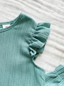 Vintaside Kids Bộ đồ thể thao cho bé gái gồm áo thun ngắn tay chất liệu vải có họa tiết, thiết kế cài cúc phía sau và quần dài kiểu dáng thường ngày. - màu xanh lá - Xem 5