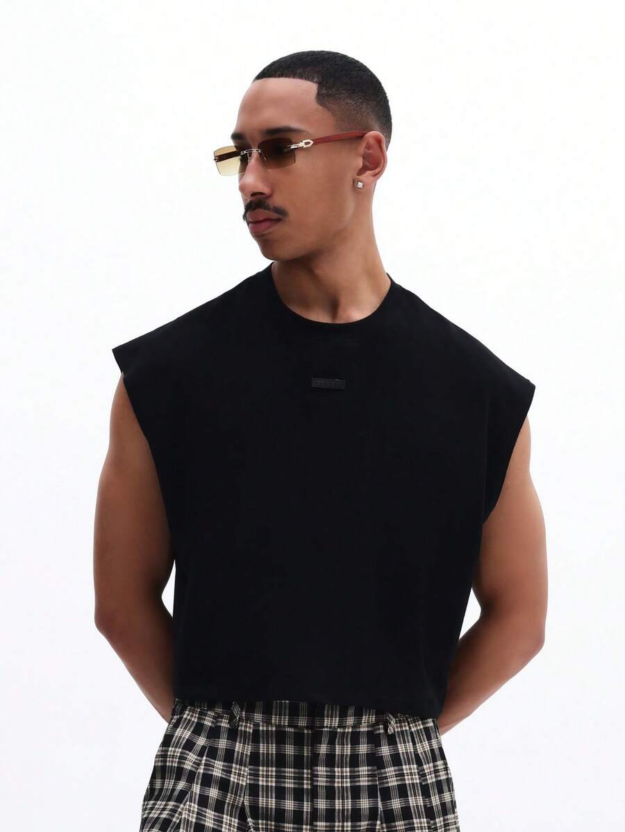 SUMWON Camiseta sin mangas para hombre con cuello redondo, casual de verano, de color sólido, tipo chaleco, ajuste regular, uso básico diario - Negro - Ver 1