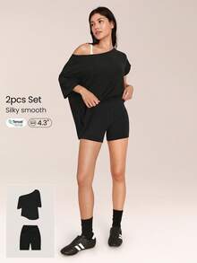 GLOWMODE 2 Pieces Tencel™ Modal 4.3''Asymmetric Relaxed Off-Shoulder Tee & 4.3" FeatherFit™ Buttery-Soft Crossover Biker Shorts Gym Cycling Running - Black - View 1