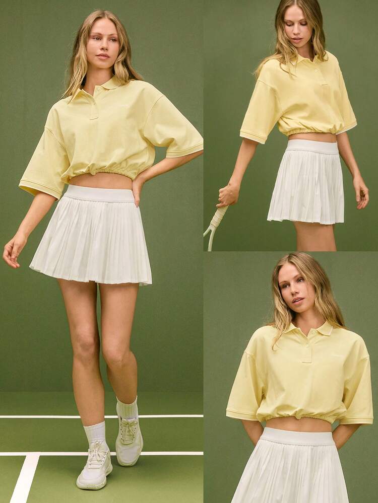 Cotton Pique Clubhouse Relaxed Fit Contrasting Neckline Cuff Trim Adjustable Drawstring Hem Cropped Cinched Polo Top Tennis Golf Pickleball Daily Casual Wear