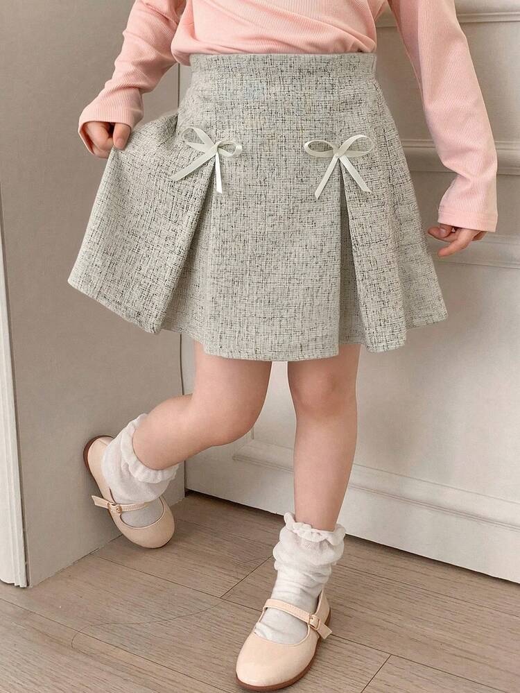 Dazy Kids Váy ngắn xếp ly trang trí nơ cho bé gái, kiểu dáng thường ngày, đa năng. - Màu be - Xem 1