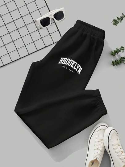 Mujer006 Pantalones largos cómodos y casuales para señora de cuatro estaciones Pantalones sueltos de color negro con el estampado "BROOKLYN NEW YORK" que son ideales para el confort y el estilo casual