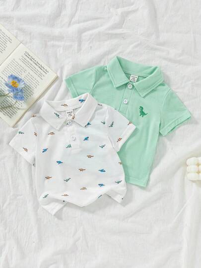 SHEIN Vintaside Kids 男婴夏季POLO衫两件套，采用针织面料，宽松版型，厚度适中，藏蓝色调沉稳大气，条纹印花时尚亮眼，展现休闲活力。POLO领设计增添一丝优雅，适合玩耍，搭配牛仔短裤和运动鞋，宛如一位帅气的小绅士。也适合居家休闲、婚礼、度假、学校学习、演出活动、参加派对等场合。