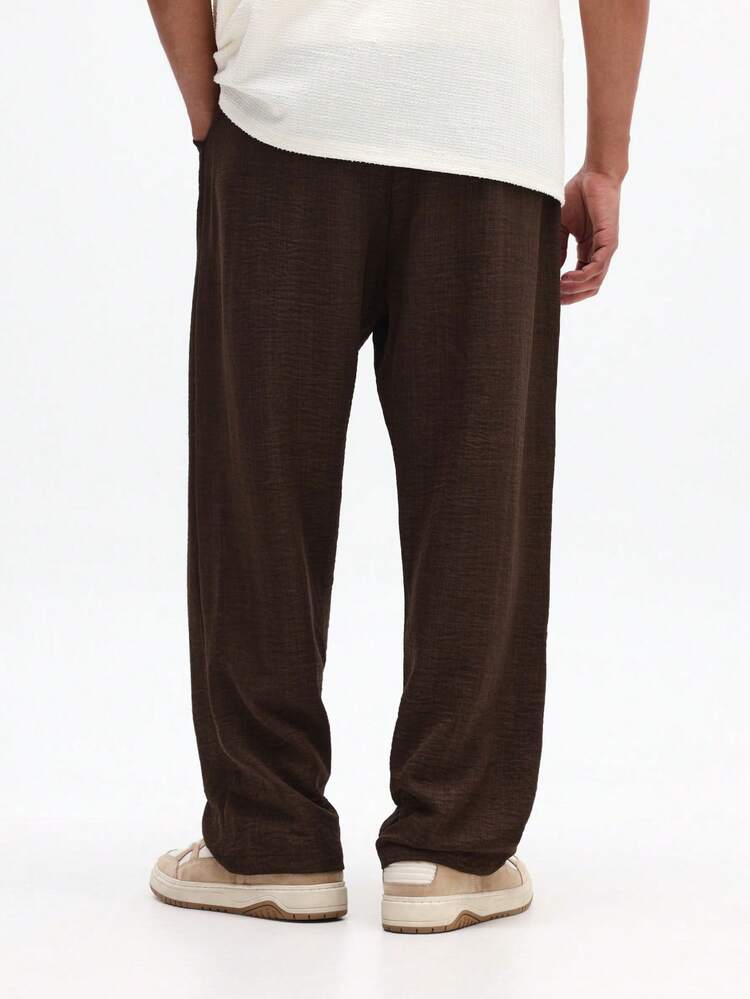 Pantalon large effet lin avec cordon de serrage