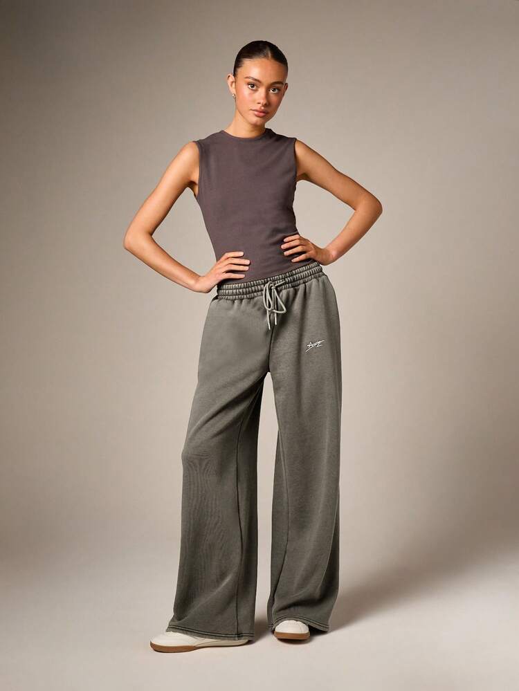 Pantaloni della tuta con coulisse a gamba larga e logo ricamato