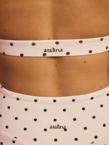 Aralina Bộ đồ thể thao năng động 2 mảnh dành cho nữ, áo croptop cổ yếm và quần short in họa tiết chấm bi, thích hợp cho tập gym và tập luyện. - Đen và trắng - Xem 5