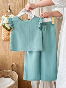 Vintaside Kids Bộ đồ thể thao cho bé gái gồm áo thun ngắn tay chất liệu vải có họa tiết, thiết kế cài cúc phía sau và quần dài kiểu dáng thường ngày. - màu xanh lá - Xem 1