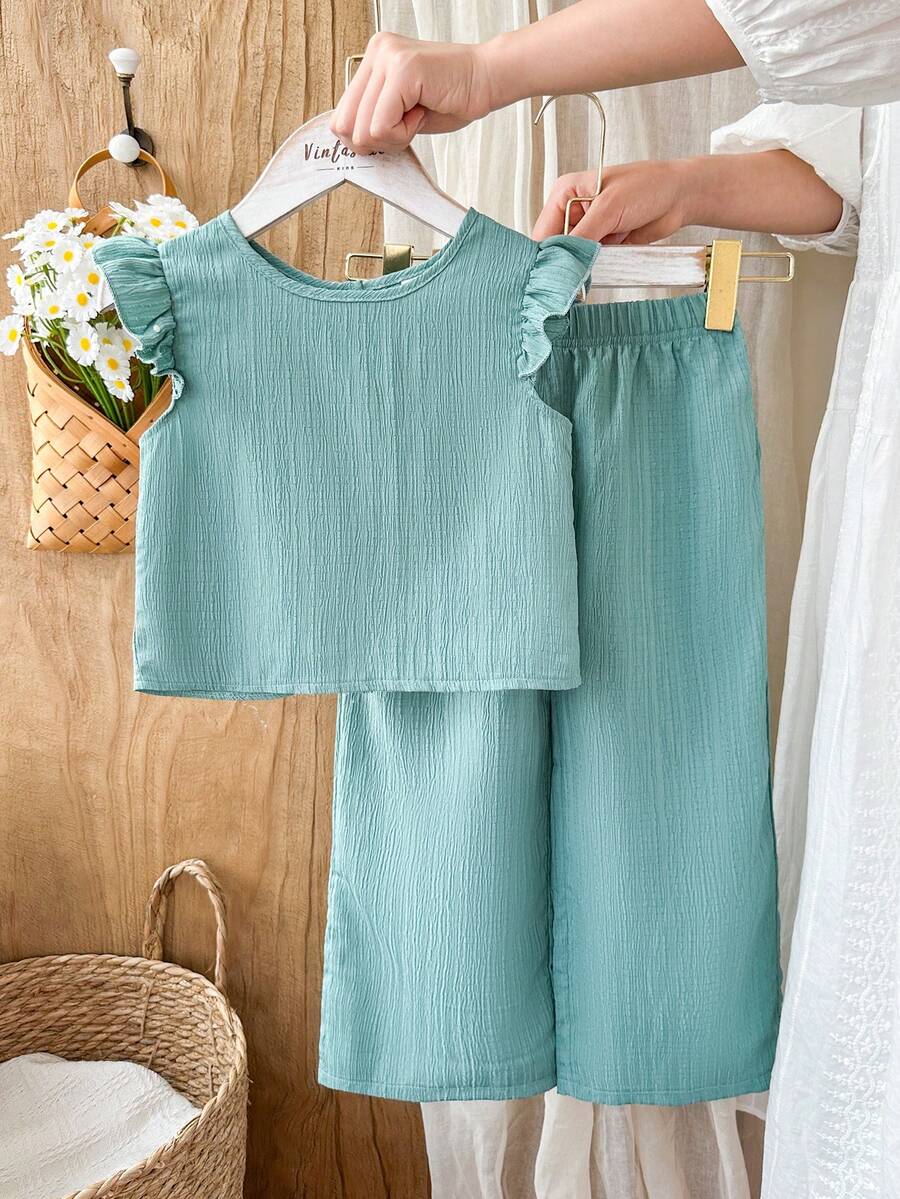 Vintaside Kids Bộ đồ thể thao cho bé gái gồm áo thun ngắn tay chất liệu vải có họa tiết, thiết kế cài cúc phía sau và quần dài kiểu dáng thường ngày. - màu xanh lá - Xem 1