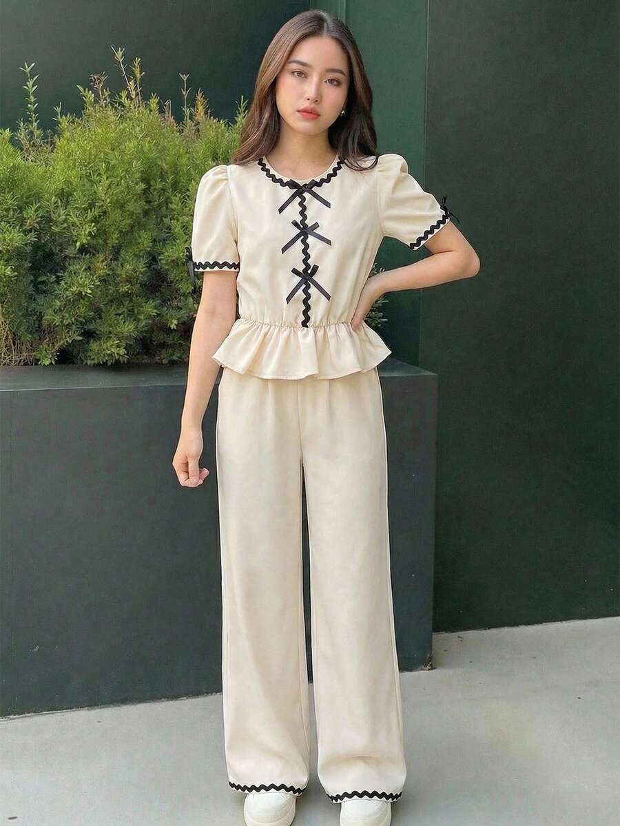 SHEIN ملابس علوية رقبة دائرية مع فيونكة ملونة وأكمام منتفخة وبنطلون واسع بخصر مطاطي مريح، طقم من قطعتين مناسب للعطلات والإجازات، للربيع والصيف - لون مشمشي - مشاهدة 1