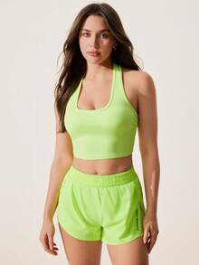 Core Rhythm Top deportivo corto sin espalda de unicolor con cuello halter - verde fluorescente - Ver 4