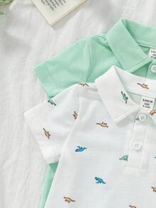 SHEIN Vintaside Kids 男婴夏季POLO衫两件套，采用针织面料，宽松版型，厚度适中，藏蓝色调沉稳大气，条纹印花时尚亮眼，展现休闲活力。POLO领设计增添一丝优雅，适合玩耍，搭配牛仔短裤和运动鞋，宛如一位帅气的小绅士。也适合居家休闲、婚礼、度假、学校学习、演出活动、参加派对等场合。 - 彩色 - 查看 8