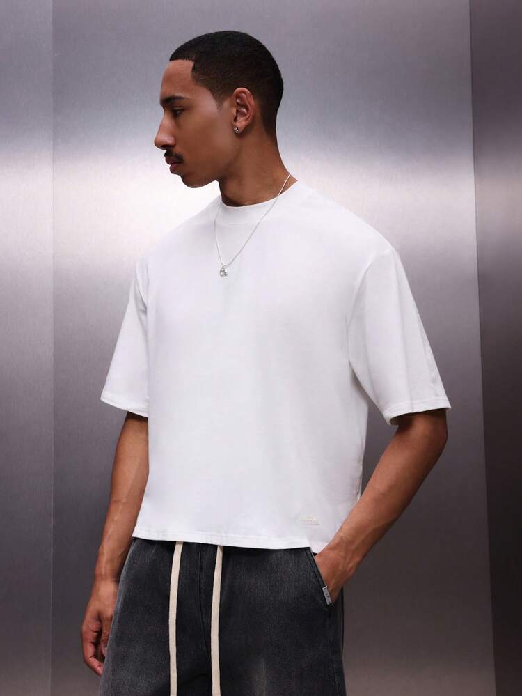 PLAYBOY X SUMWON T-shirt blanc à manches courtes col rond avec imprimé vague de chaleur pour vacances, coupe ample pour homme