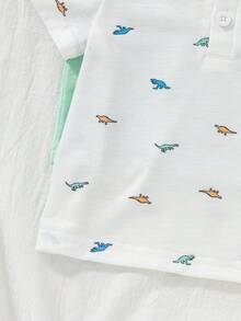 SHEIN Vintaside Kids 男婴夏季POLO衫两件套，采用针织面料，宽松版型，厚度适中，藏蓝色调沉稳大气，条纹印花时尚亮眼，展现休闲活力。POLO领设计增添一丝优雅，适合玩耍，搭配牛仔短裤和运动鞋，宛如一位帅气的小绅士。也适合居家休闲、婚礼、度假、学校学习、演出活动、参加派对等场合。 - 彩色 - 查看 7