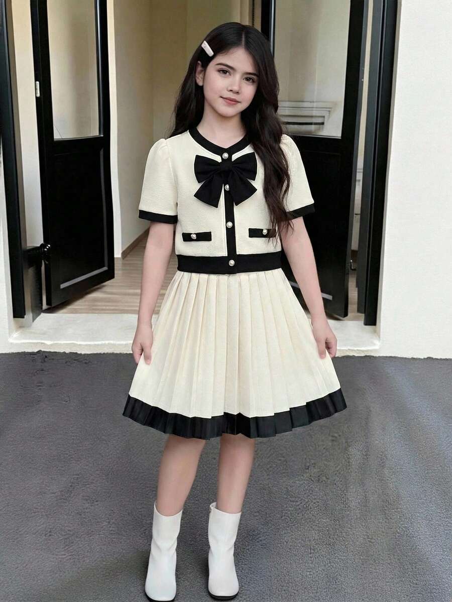 少女春夏V领蝴蝶结水钻纽扣上衣搭配高腰百褶迷你裙套装，优雅时尚，适合日常穿着、派对和通勤。 - 彩色 - 查看 1