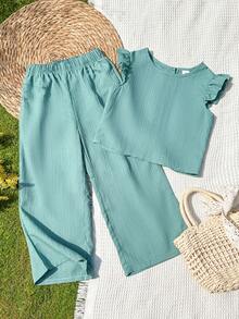 Vintaside Kids Bộ đồ thể thao cho bé gái gồm áo thun ngắn tay chất liệu vải có họa tiết, thiết kế cài cúc phía sau và quần dài kiểu dáng thường ngày. - màu xanh lá - Xem 3