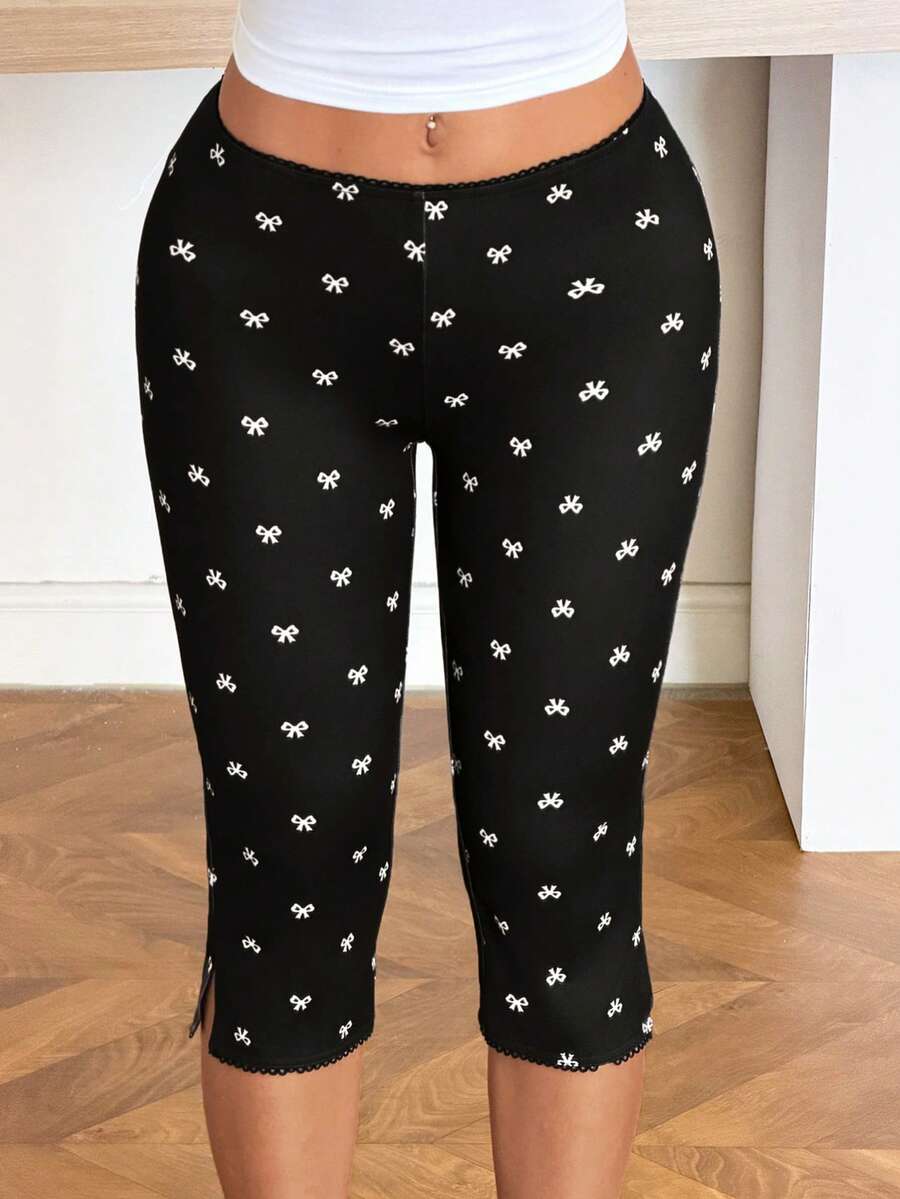 SHEIN EZwear Leggings capri ajustados para mujer con corbata de moño sobre fondo negro - Blanco y Negro - Ver 1