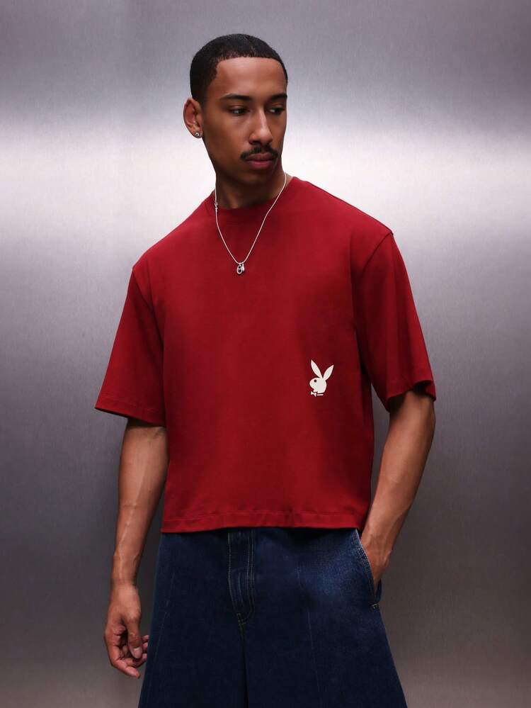 PLAYBOY X SUMWON Herren Urlaubs Boxy Fit rotes Kurzarm Crew Neck T-Shirt mit Chili Pfeffer Muster, lässiges Streetwear Oberteil